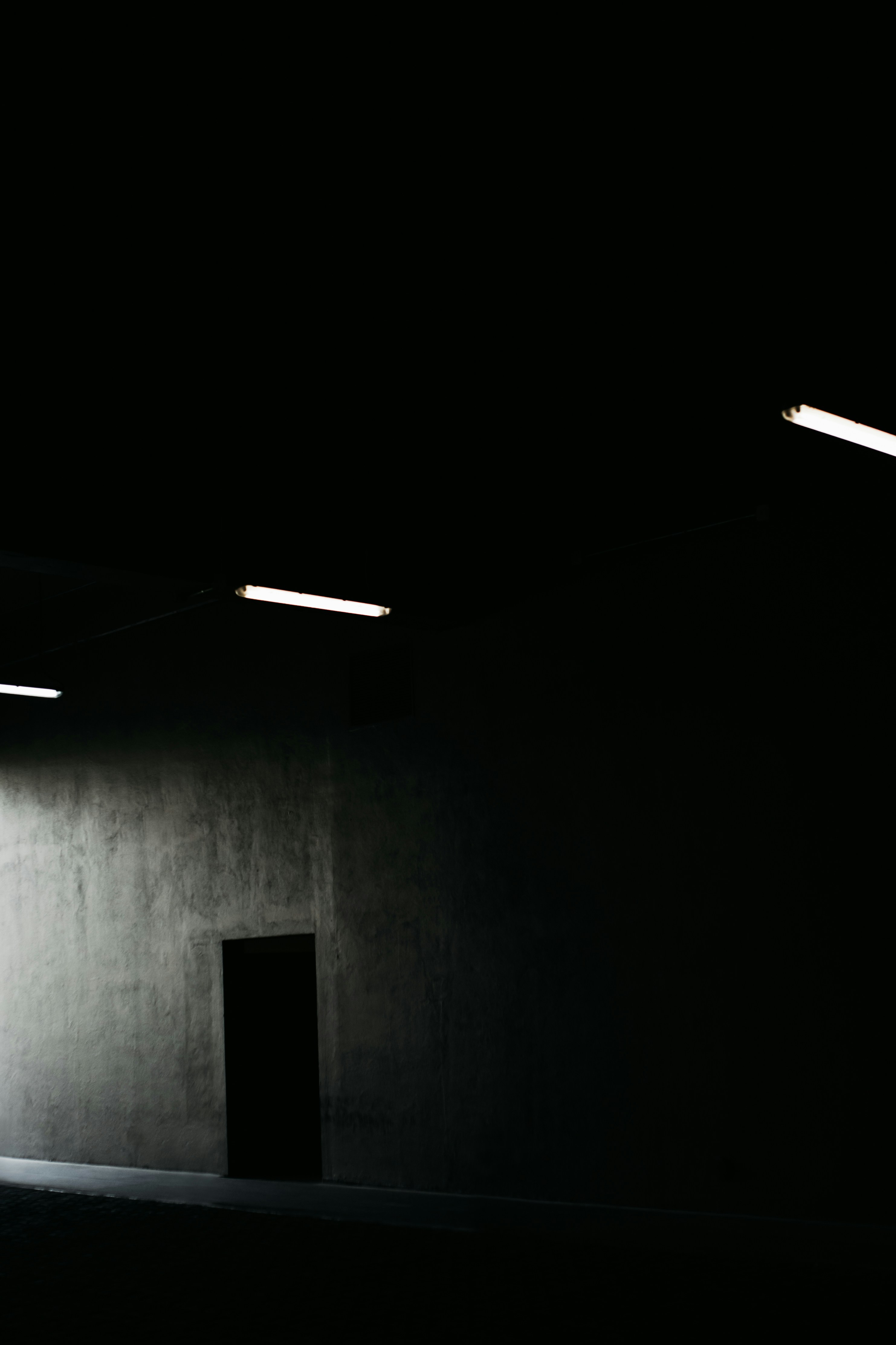 Black Door with white wall